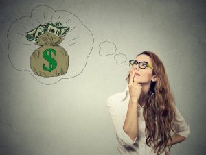 Woman dreaming of financial success