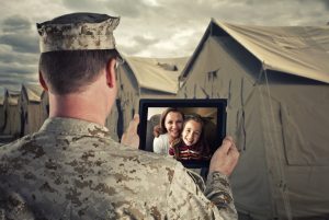 Serviceman uses a computer tablet
