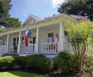 old-historical-home-in-southern-usa-front-porch-woman-texas-picture-id115904472